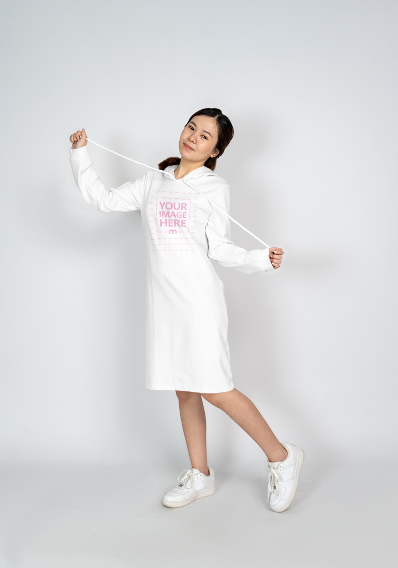 Hoodie Dress Mockup With a Smiling Young Woman